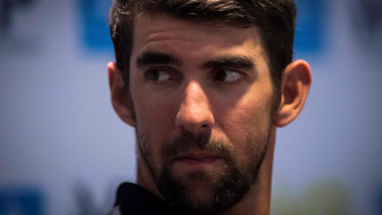 Michael Phelps no longer sits next to any world records. Picture: AFP PHOTO / LIONEL BONAVENTURE