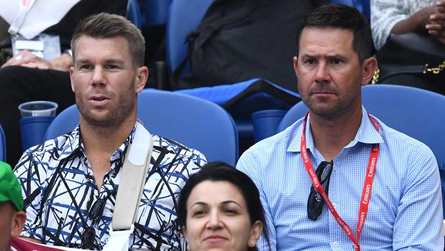 David Warner and Ricky Ponting watching the tennis. Picture: Getty Images 