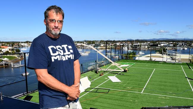 Wayne Geoffrey Dwyer was found to be in contempt by the Environment and Planning Court regarding a rooftop tennis court.