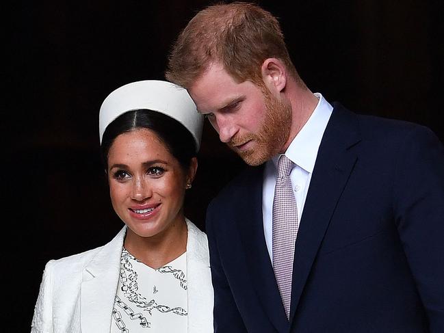 (FILES) In this file photo taken on March 11, 2019 Britain's Prince Harry, Duke of Sussex (R) and Meghan, Duchess of Sussex leave after attending a Commonwealth Day Service at Westminster Abbey in central London. - Britain's royal family on Sunday braced for further revelations from Prince Harry and his American wife, Meghan, as a week of transatlantic claim and counter-claim reaches a climax with the broadcast of their interview with Oprah Winfrey. (Photo by Ben STANSALL / AFP)