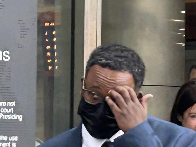 Fraudster Abdulkadir Ibrahim leaves County Court after pleading guilty to rorting taxpayers of nearly $465,000 in fraudulent Medicare claims.