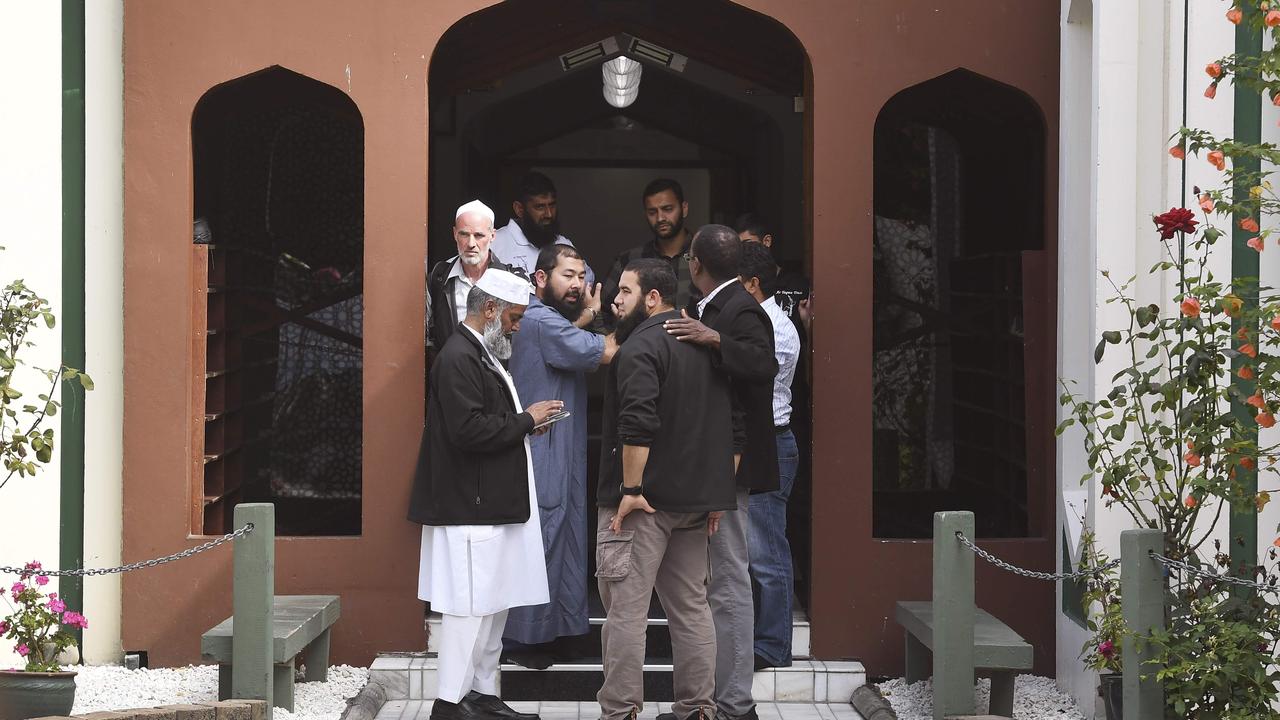 Members of the local Muslim community enter the Al Noor mosque after is was reopened Picture: William West/AFP