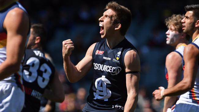 South Adelaide’s Joel Cross celebrates kicking a goal against Adelaide.