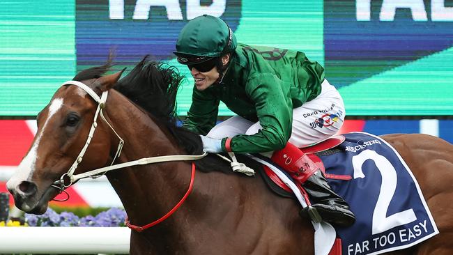 Craig Williams can’t hold back a smile as he wins The Kosciuszko aboard Far Too Easy. Picture: Jeremy Ng / Getty Images