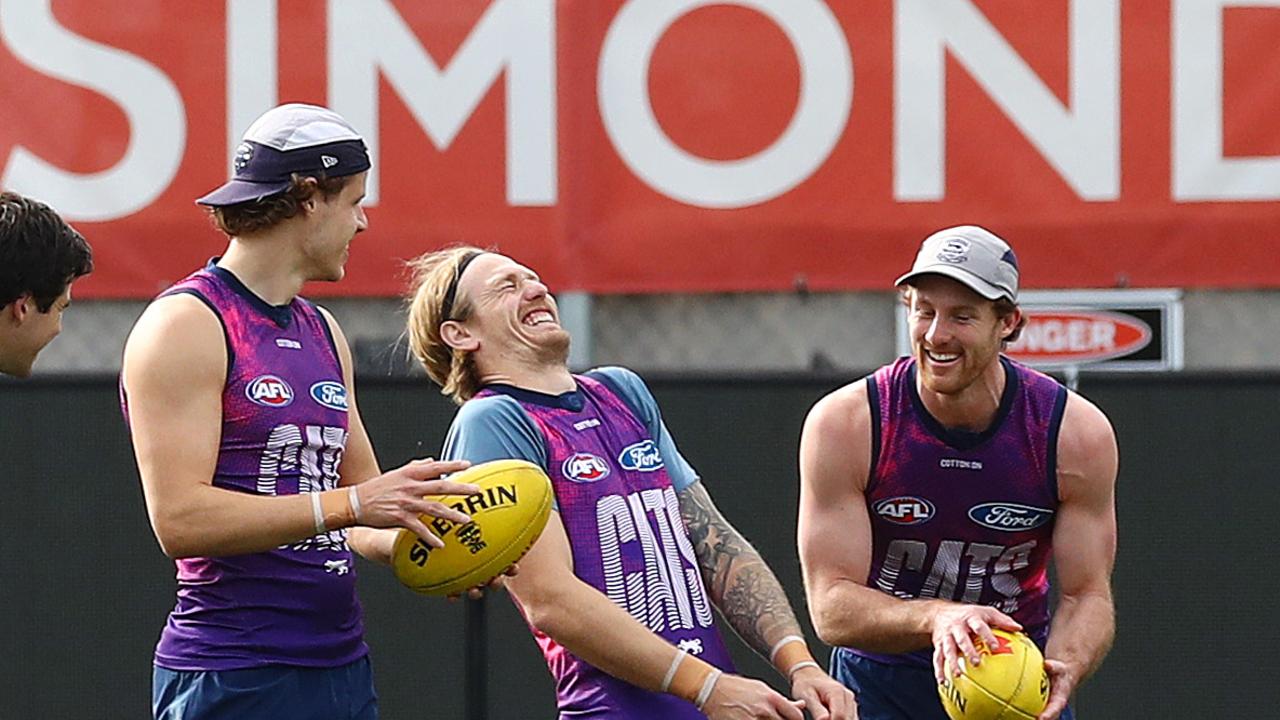 Jake Kolodjashnij at training ahead of his 150th match for the Geelong Cats with Tom Stewart and Jed Bews. Picture: Alison Wynd