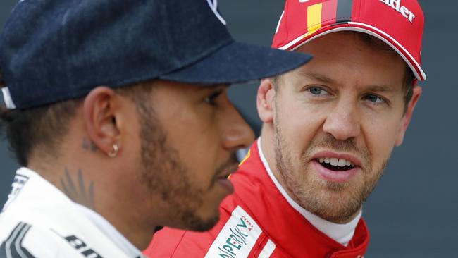 Sebastian Vettel will battle Lewis Hamilton once again. (AP Photo/Frank Augstein)
