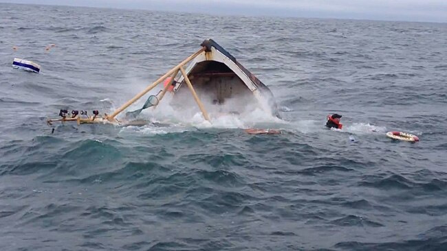 Dramatic sea rescue caught on video as fishermen abandon ship when boat ...