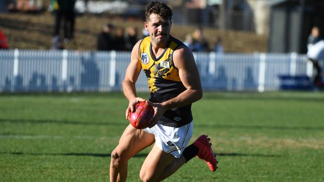 Riley Dyson charges forward for Whittlesea in last weekend’s loss to Northcote Park.