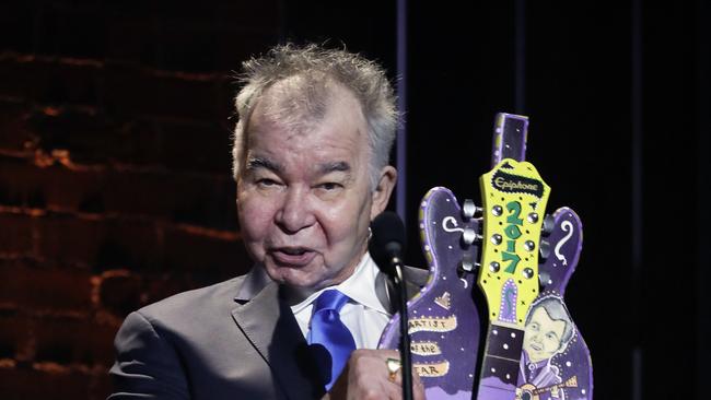 John Prine accepts the artist of the year award during the Americana Honors and Awards show in Nashville in 2017. Picture: AP.