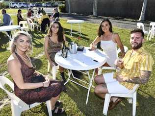 Jessica Rayner, Vai Millmore, Charlie Jones and Kaine McKenna show some style on Coffs Cup day. Picture: Adam Hourigan