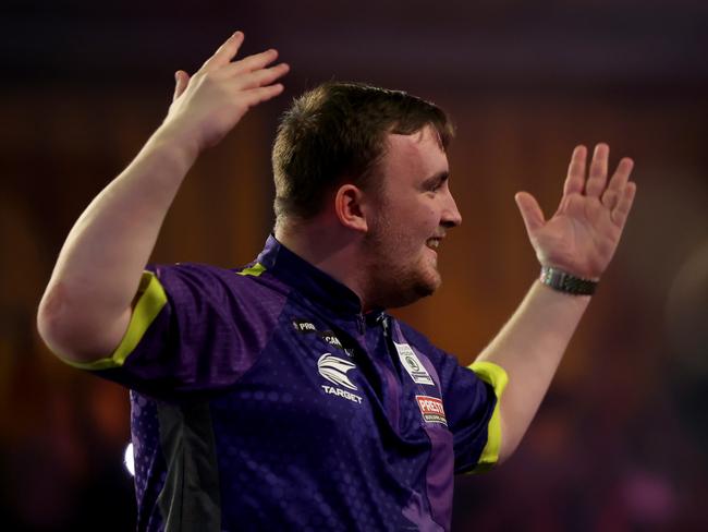 LONDON, ENGLAND - JANUARY 02: Luke Littler of England celebrates during his semi final match against Rob Cross of England on day 15 of the 2023/24 Paddy Power World Darts Championship at Alexandra Palace on January 02, 2024 in London, England. (Photo by Tom Dulat/Getty Images)