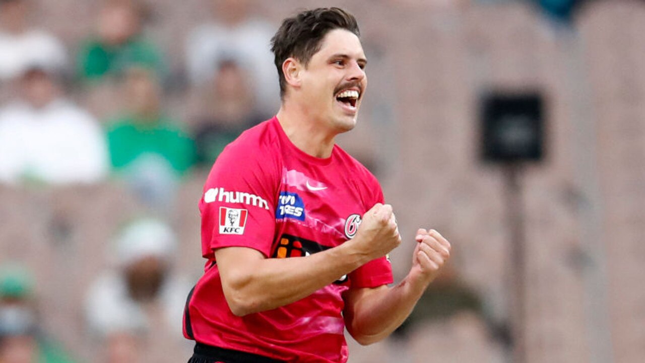 MELBOURNE, AUSTRALIA - DECEMBER 15: Ben Dwarshuis of the Sixers celebrates the wicket of Marcus Stoinis of the Melbourne Stars during the Men's Big Bash League match between the Melbourne Stars and the Sydney Sixers at Melbourne Cricket Ground, on December 15, 2021, in Melbourne, Australia. (Photo by Darrian Traynor/Getty Images)