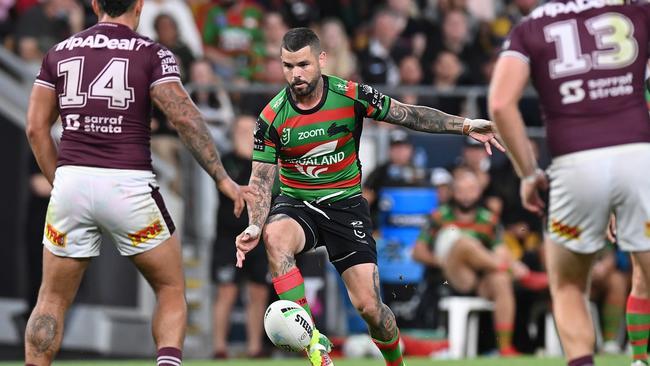 BRISBANE, AUSTRALIA - SEPTEMBER 24:  Adam Reynolds of the Rabbitohs kicks the ball during the NRL Preliminary Final match between the South Sydney Rabbitohs and the Manly Sea Eagles at Suncorp Stadium on September 24, 2021 in Brisbane, Australia. (Photo by Bradley Kanaris/Getty Images)