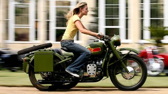 Katie Percy, riding a Chinese motorbike in London. Picture: Getty Images