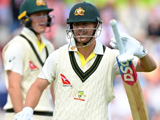 MANCHESTER, ENGLAND - JULY 19: David Warner of Australia walks off after being dismissed by Chris Woakes of England during Day One of the LV= Insurance Ashes 4th Test Match between England and Australia at Emirates Old Trafford on July 19, 2023 in Manchester, England. (Photo by Clive Mason/Getty Images)