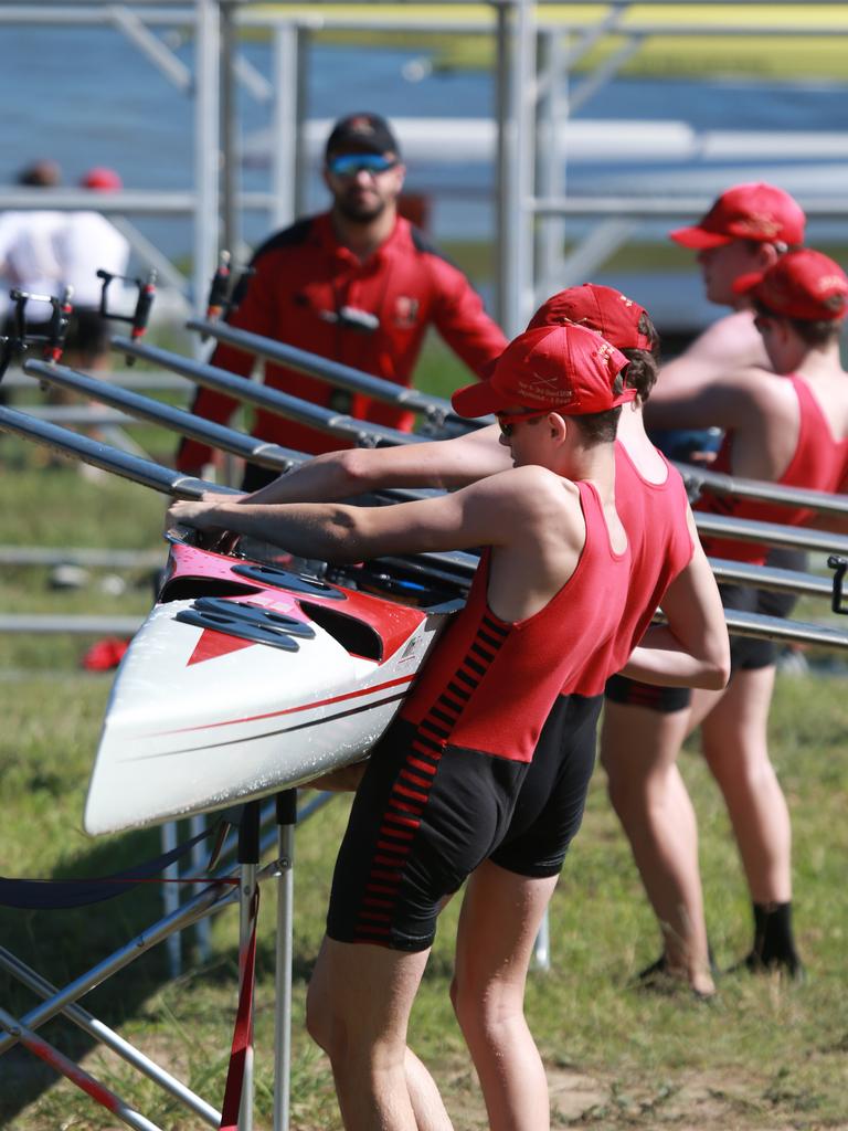 Students get their shells ready at the GPS Head of the River, Lake Wyaralong. Picture: Sarah Marshall/AAP