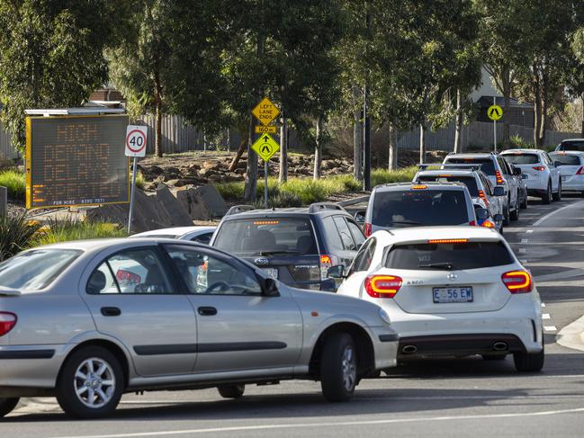 Cars queueing outside a COVID-19 testing site at Highpoint Shopping Centre in Melbourne on Tuesday. Picture: AAP