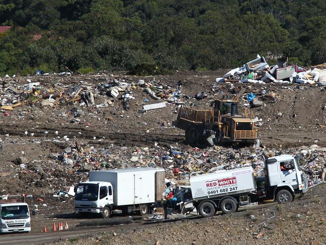 Federal Opposition Leader Tony Abbott pictured at the Reedy Creek landfill site with local Mayor Tom Tate and Federal Member for McPherson Karen Andrews. Councils are about to be hit with the carbon tax on landfill site sites