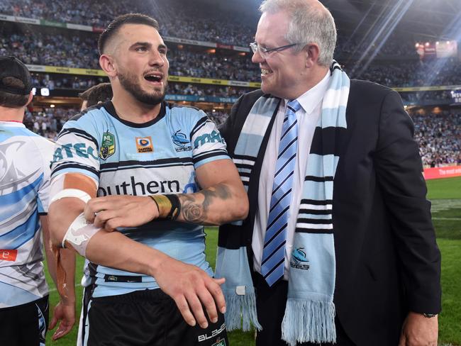 Jack Bird of the Sharks with Scott Morrison after the 2016 Grand Final win. 