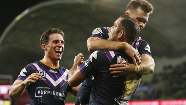 MELBOURNE, AUSTRALIA - SEPTEMBER 06: Storm players celebrate during the round 25 NRL match between the Melbourne Storm and the North Queensland Cowboys at AAMI Park on September 06, 2019 in Melbourne, Australia. (Photo by Daniel Pockett/Getty Images)