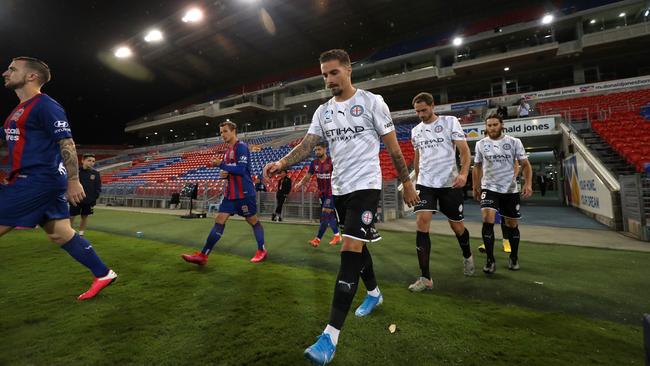 Jamie Maclaren of Melbourne City walks out to start the game against the Newcastle Jets and Melbourne City on Monday night. Picture: Getty Images