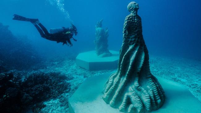 Two of the new sentinels at the Museum of Underwater Art, off Townsville. Picture: Townsville Enterprise