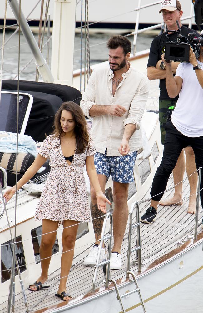 Locky Gilbert pictured on-board the Sir Thomas Sopwith at Rushcutters Bay picking up a brunette contestant for a sailing date on Sydney Harbour. Picture: Matrix