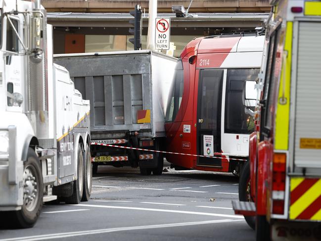 A section of Pitt St in now closed as crews scramble to clear the area. Picture: Richard Dobson