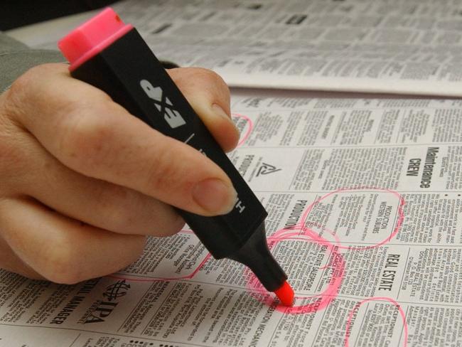 14/04/2005. Generic photo of a job seeker circling ads in the employment section of a newspaper. Job hunting. Unemployment.