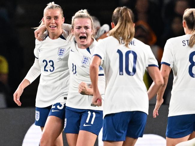 SYDNEY, AUSTRALIA - AUGUST 12: Lauren Hemp of England celebrates after scoring her team's first goal with teammates during the FIFA Women's World Cup Australia &amp; New Zealand 2023 Quarter Final match between England and Colombia at Stadium Australia on August 12, 2023 in Sydney, Australia. (Photo by Amy Halpin/DeFodi Images via Getty Images)