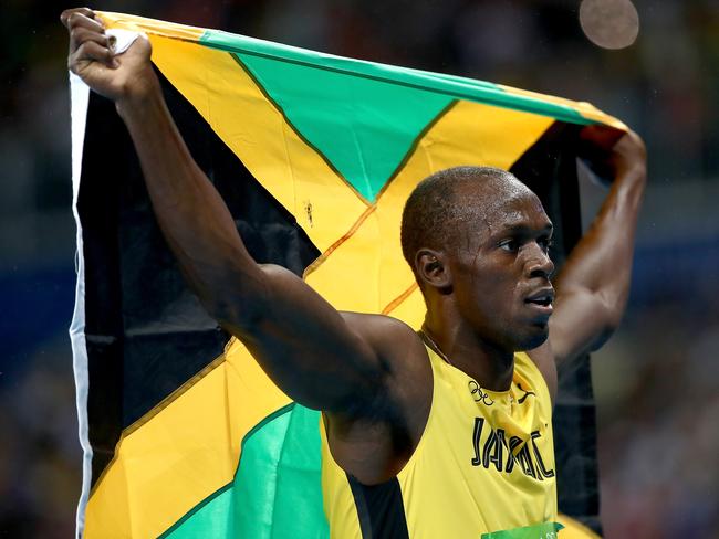 RIO DE JANEIRO, BRAZIL - AUGUST 18: Usain Bolt of Jamaica celebrates winning the Men's 200m Final on Day 13 of the Rio 2016 Olympic Games at the Olympic Stadium on August 18, 2016 in Rio de Janeiro, Brazil. (Photo by Cameron Spencer/Getty Images)