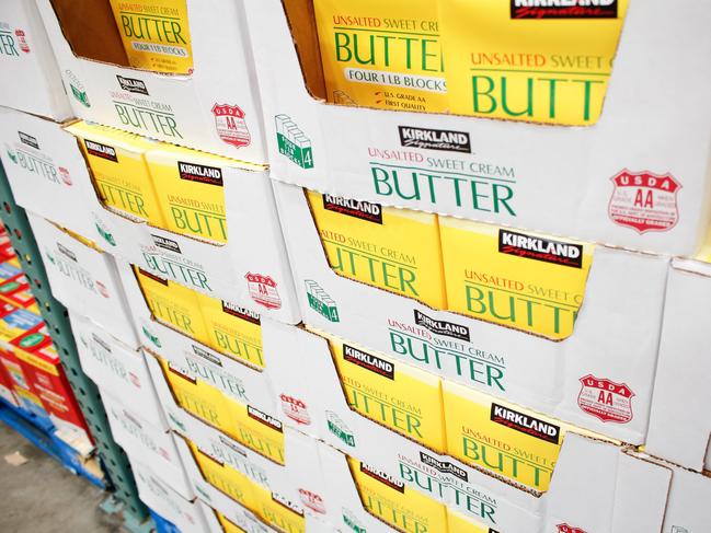 ONE TIME WEB USE FOR NEWS.COM.AU ONLY - FEES APPLY - MUST DOWNLOAD ON OWN ACCOUNT - 2XK7J69 Los Angeles, California, United States - 04-06-2021: A view of several cases of Kirkland Signature unsalted sweet cream butter, at Costco. Picture: Alamy