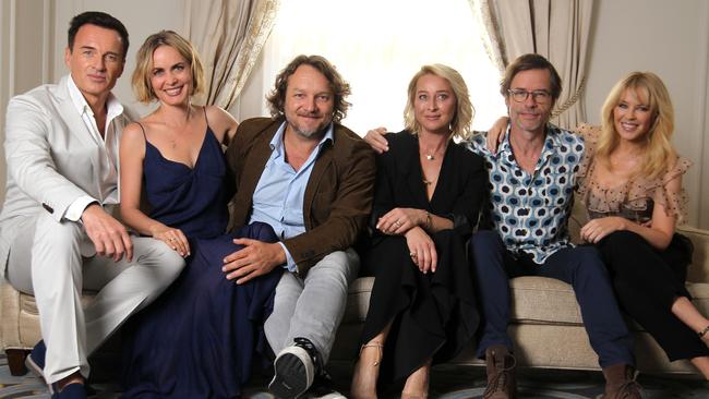 L-R: Swinging Safari cast members Julian McMahon, Radha Mitchell, Jeremy Sims, Asher Keddie, Guy Pearce and Kylie Minogue in Sydney this week. Picture: AAP