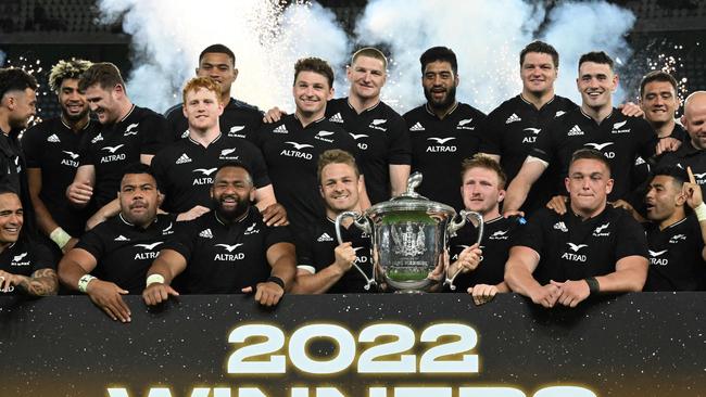 New Zealand players celebrate with the trophy after winning the Bledisloe Cup for 2022. Picture: AFP