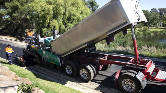 The first South Australian road built with soft plastics and glass has been laid in Happy Valley.