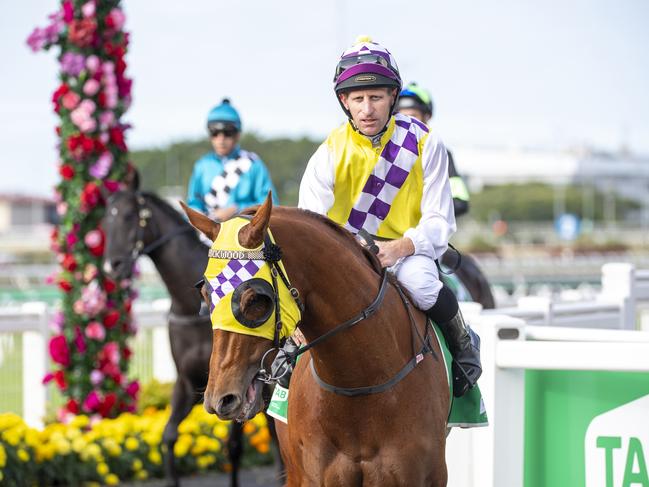 Jockey Dale Smith returns to scale after riding In Good Time to victory in the Tab Ascot Handicap. Picture: AAP/Supplied by Michael McInally, Racing Queensland