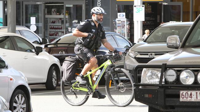 Members of the QLD Police force taking part in Operation Bombous pictured at 28 Dixon Drive, Pimpama, Junction Shopping Centre. Pic Mike Batterham