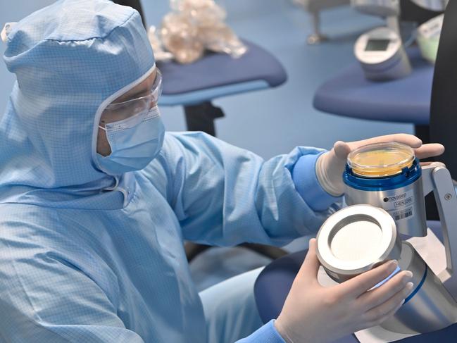 An employee performs an air quality test at the Thermo Fisher plant, a supplier of AstraZeneca for the production of its COVID-19 vaccine. Picture: AFP