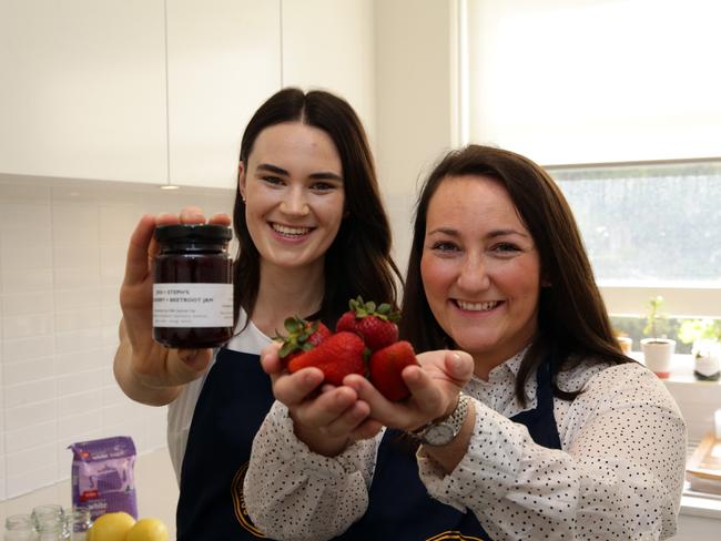 City branch members Stephanie Scott and Jessica Best showing off their jam-making skills. Picture: Craig Wilson