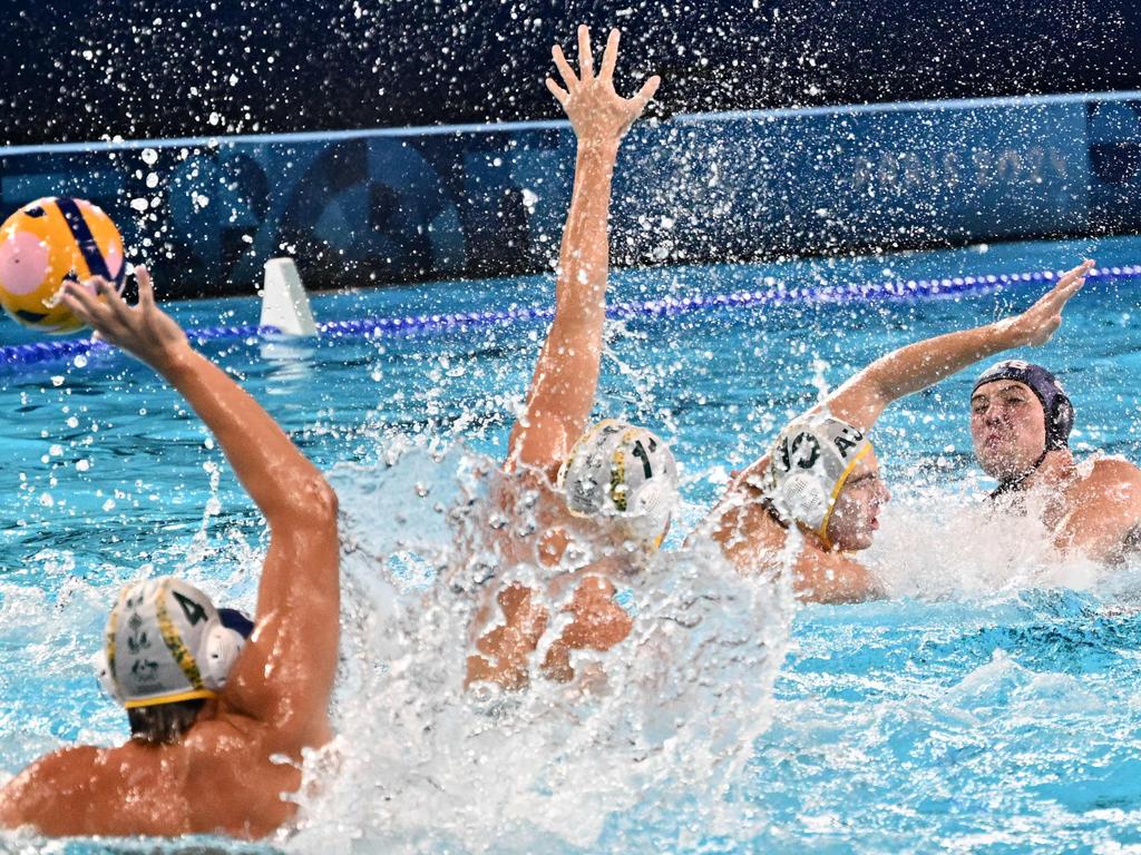 Serbia's #02 Dusan Mandic, right, shoots the ball in the men's water polo preliminary round group B match between Australia and Serbia at the Aquatics Centre in Saint-Denis, north of Paris. Picture: Andreas Solaro/AFP