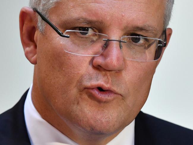 Australian Prime Minister Scott Morrison is seen during a press conference in Honiara in the Solomon Islands, on Monday, June 3, 2019. Prime Minister Morrison is visiting the Solomon Islands on his first post-election overseas trip before traveling to the United Kingdom and Singapore. (AAP Image/Darren England) NO ARCHIVING