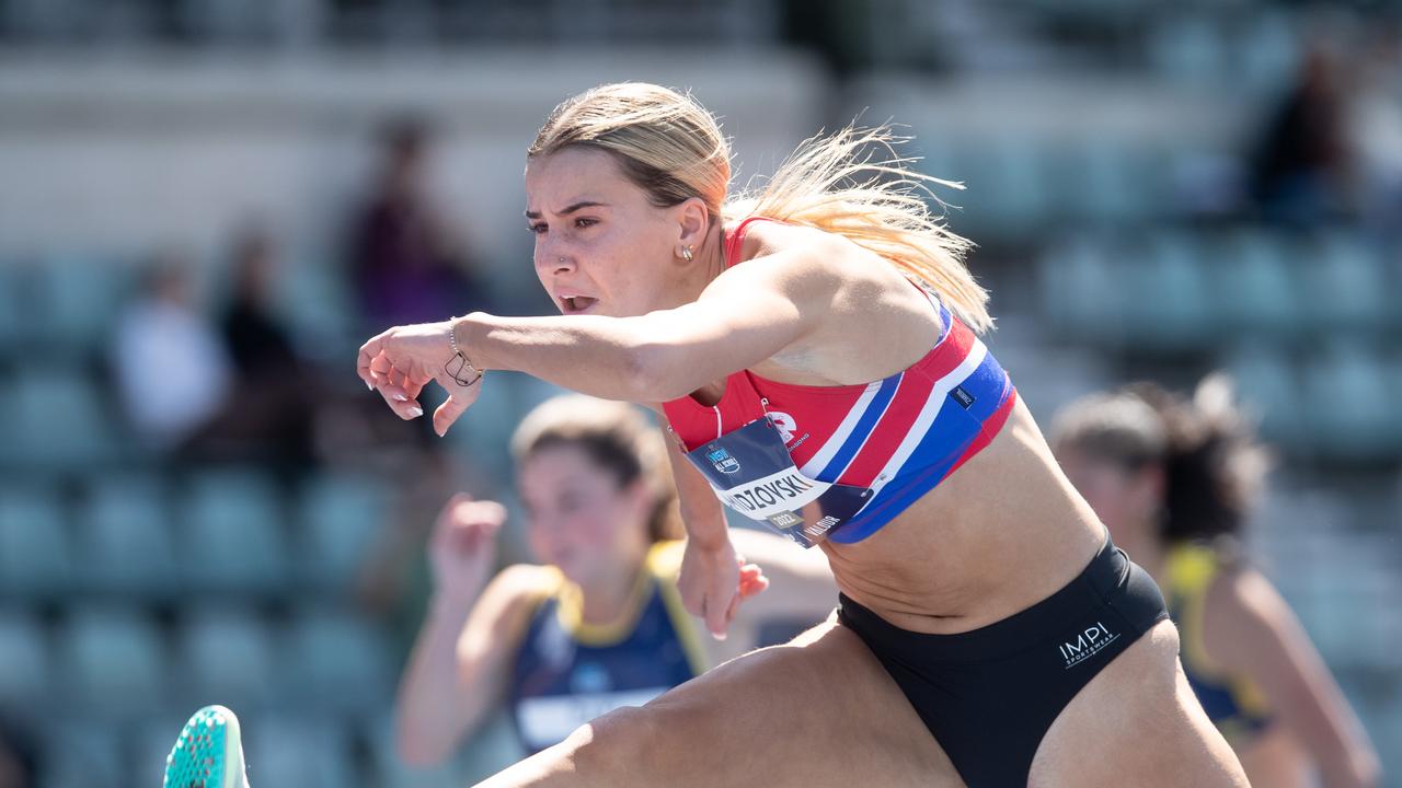 Delta Amidzovski in action at the NSW All Schools event where she won the 16 years 100m hurdles with a meet record.