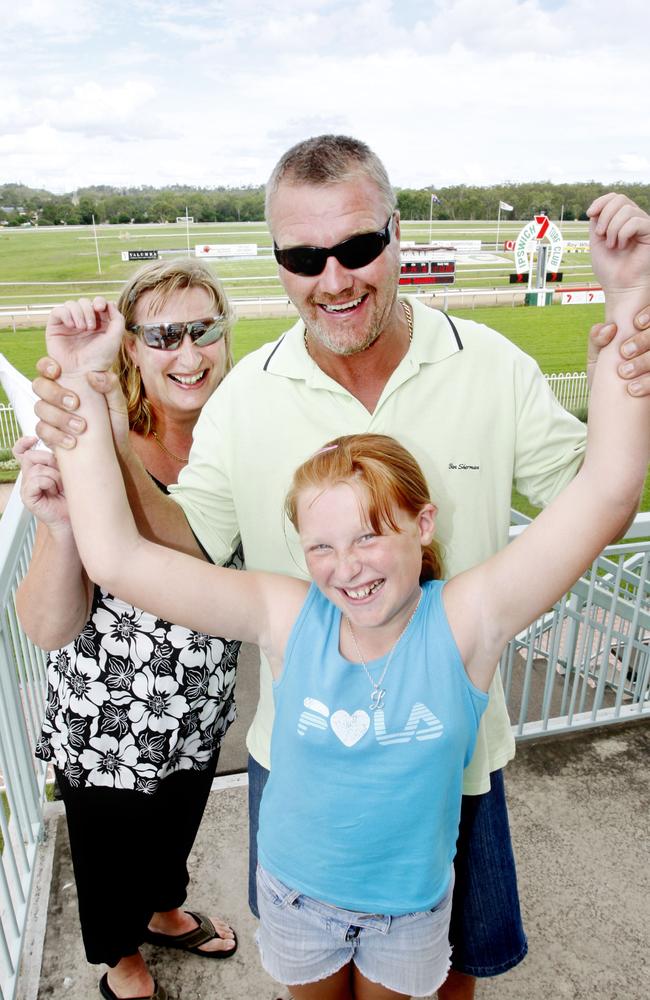 Pat and Nigel Huyton with their daughter Libby at the Ipswich Turf Club for the New Year’s Eve celebration in 2009. Picture: Sarah Harvey