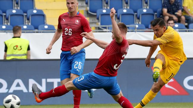 Andrew Nabbout slots home the Socceroos second goal.