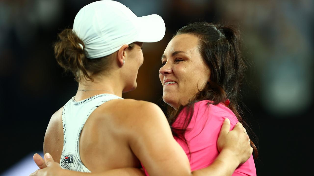 Ashleigh Barty is embraced by Casey Dellacqua. Photo by Clive Brunskill/Getty Images.