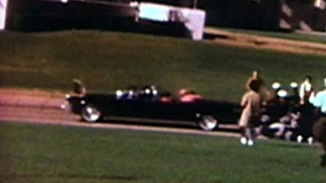 Film footage of the assassination of John F. Kennedy.