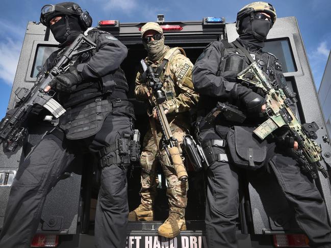 The Queensland Police Service (QPS) and Australian Defence Force (ADF) hold a capability demonstration for the Gold Coast 2018 Commonwealth Games at Broadwater Parklands. SERT squad members at the ready. Picture Glenn Hampson