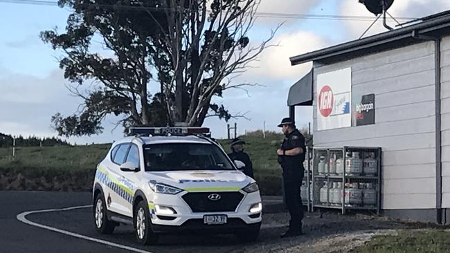 Police pictured earlier today at the South Riana shop. Photo: Helen Kempton