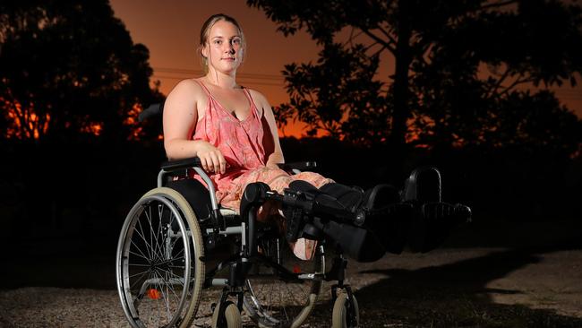 DAILY TELEGRAPH - 22 MARCH, 2022. Shafiqa Irwin 26 and partner Alexander Heilpern 35 pictured at their temporary accommodation in Broken Head after their rental house in Wilson's Creek was hit by a landslide during the floods, wiping out the bottom floor of their house. Shafiqa suffered two broken feet and needed to be helicoptered out while Alex hurt his ankle after being pinned against a wall in the house and was knocked unconscious. Picture: Toby Zerna