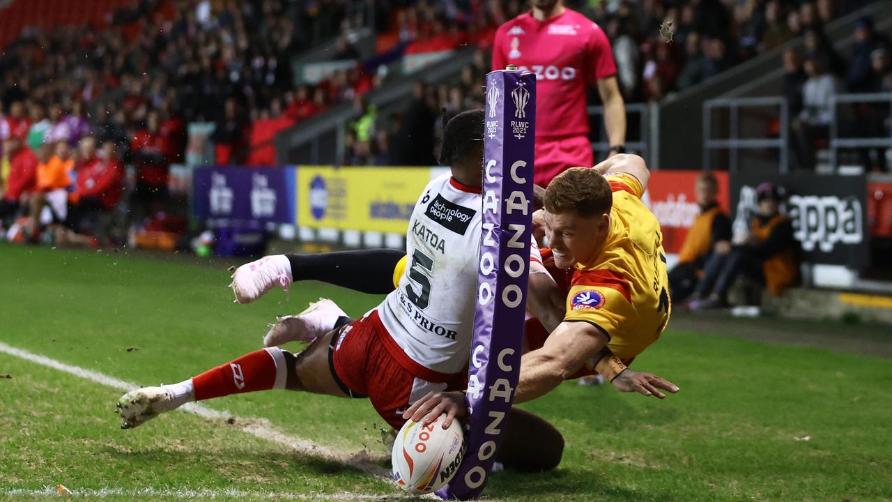 Dan Russell is tackled into touch by Sione Katoa. Picture: Michael Steele/Getty Images